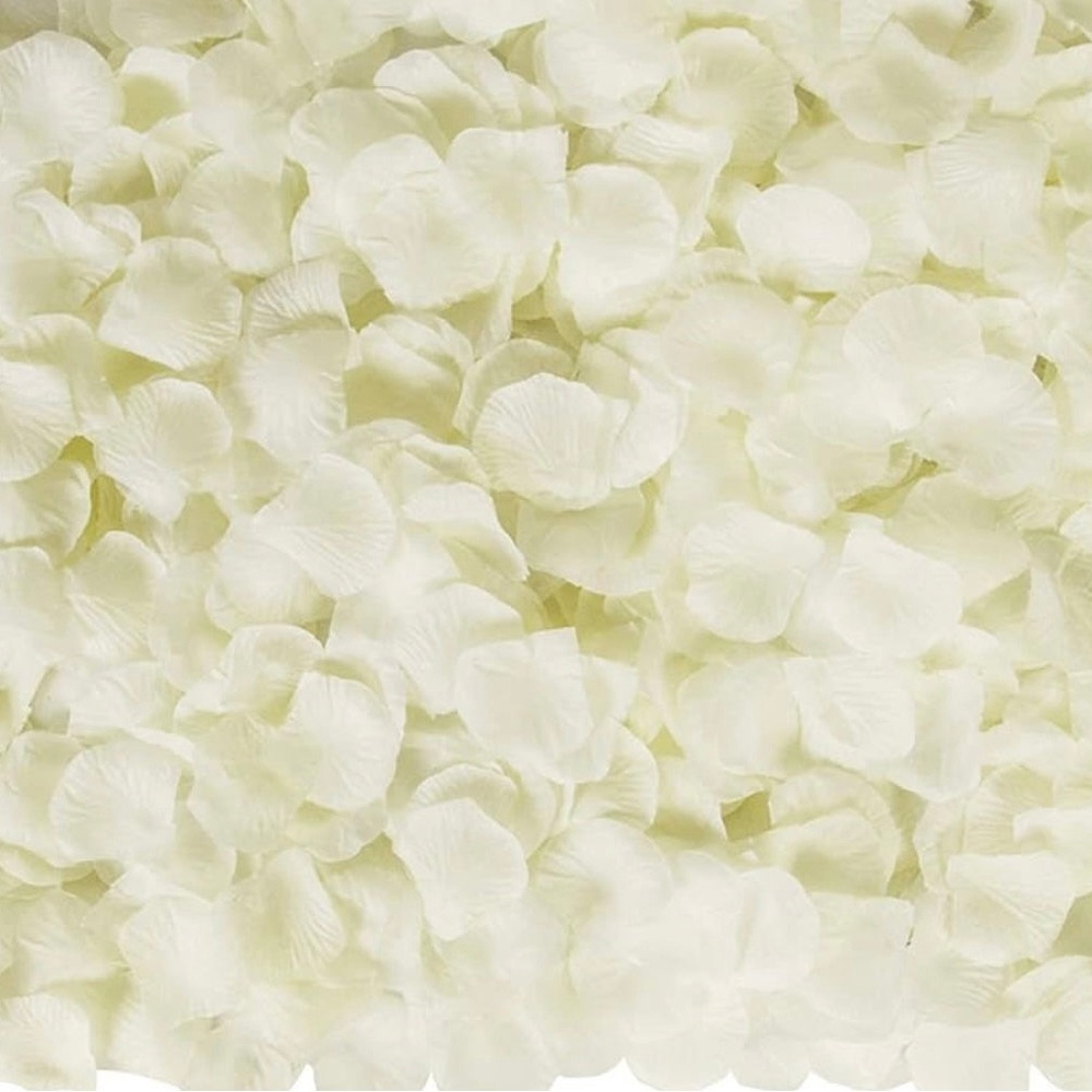 Artificial Ivory rose petals. 3000 pieces per bag. New in package. Unopened.